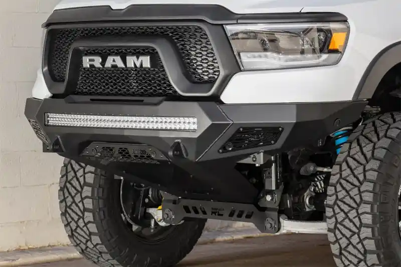 Addictive Desert Designs 2019 Ram Rebel 1500 Stealth Fighter Fr Bumper w/Parking Sensor Cutouts Place Order